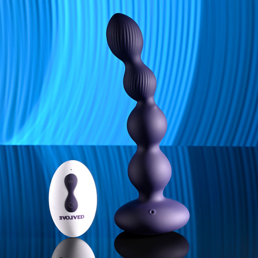 Evolved PLEASURE ORBIT - Navy Blue 17.8 cm USB Rechargeable Twirling & Vibrating Anal Beads wit