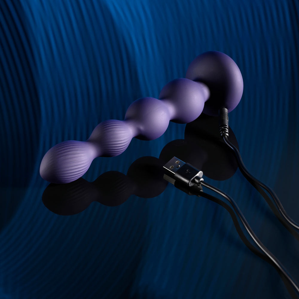 Evolved PLEASURE ORBIT - Navy Blue 17.8 cm USB Rechargeable Twirling & Vibrating Anal Beads wit